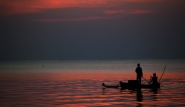 Indonesian Fishermen at Sunset