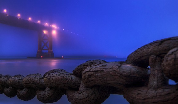 A foggy Golden Gate Bridge at Blue Hour